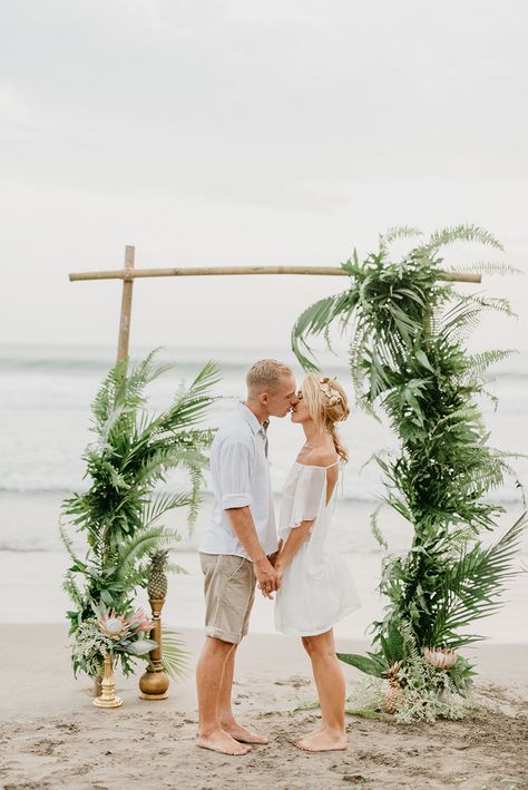 Lovely boho greenery backdrop // Eva Laszlo and photographer Peter Herman have teamed up to take us to a tropical paradise of unparalleled beauty. Shot in Villa Ethnic, Blue Karma Resort in Bali, Indonesia, the styled shoot features breezy dresses by Maga Resort In Bali, Beach Wedding Groom, Greenery Backdrop, Amazing Wedding Makeup, Beautiful Wedding Makeup, Gorgeous Wedding Makeup, Casual Beach Wedding, Coin Photo, Groom Wedding Attire