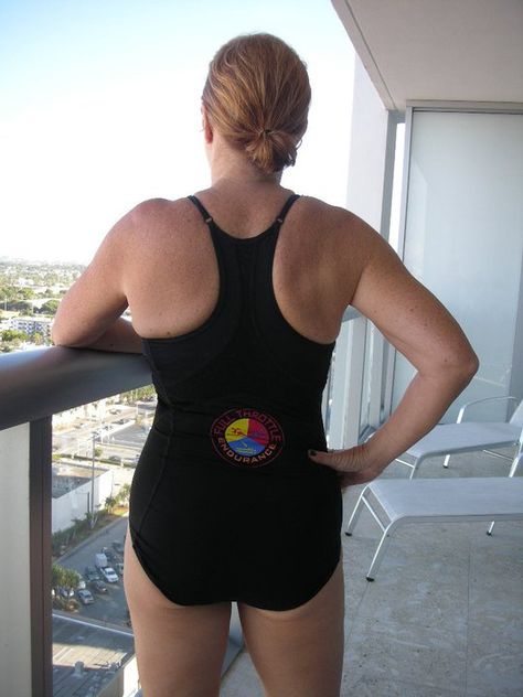 Jill Taylor Conner rocking the Full Throttle Endurance Racing one-piece from The H₂0 Collection. Yes, this a** belongs to a 57-year-old woman! Yowza! Jill Taylor, One Piece