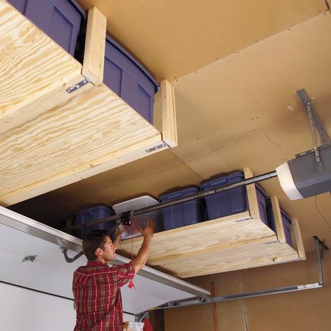 24 Cheap Garage Storage Projects You Can DIY | Family Handyman Rifacimento Garage, Wooden Garage Shelves, Hanging Garage Shelves, Pallet Deck Diy, Easy Garage Storage, Garage Ceiling Storage, Garage Ceiling, Ceiling Shelves, Garage Shelves