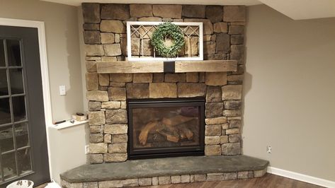 Used Eldorado moonlight rough cut in a dry stack style. Poured in place concrete hearth using z form counter frame and rock mold. Stone secured with laticrete mvis straight to durock. Used quikrete charcoal stain for the mvis veneer mortar. MVIS is expensive but worth it! Fire place is a heat n glo 8000clx. Dry Stack Fireplace, Concrete Hearth, Wood Mantle Fireplace, Eldorado Stone, Veneer Stone, Fireplace Stone, Wood Mantle, Stone Fireplaces, Building Inspiration