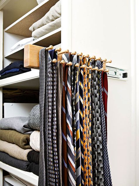 Once you dive into the world of master bedroom storage, you’ll be quick to find out that for every type of need, there’s a type of storage. Some are particularly useful, such as this sliding tie holder. It offers the vertical storage space that’s required without taking up too much width. Tiny Closet Organization, Organizing Closet, Save Closet Space, Master Closet Organization, House Closet, Tie Storage, Diy Bedroom Storage, Tie Holder, Bedroom Closet Storage