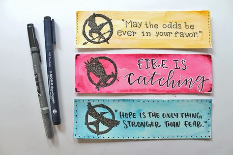 Learn how to make The Hunger Games Heat Embossed Bookmarks using this tutorial by @studiokatie for @TombowUSA Bookmarks Hunger Games, The Hunger Games Bookmarks, Drawing Ideas Hunger Games, Hunger Games Bookmark, Embossed Bookmarks, Hunger Games Crafts, Hunger Games Drawings, Hunger Games Fan Art, Hunger Games Books