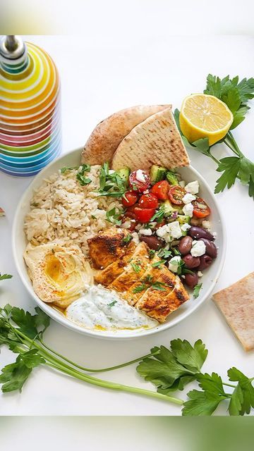 Sam Schnur on Instagram: "MEDITERRANEAN CHICKEN BOWL! The healthy lunches continue ☺️ Or delicious dinner! Juicy Spiced Chicken Breast, Rice, Greek Salad, Hummus, Tzatziki, Feta, Kalamata Olives, and Pita! See below for the recipe and let me know if you try it out ! #PHAAT … 1. Preheat your oven to 375. Season 2 chicken breasts with salt, pepper, garlic powder, dried oregano, dried thyme, paprika, and olive oil. Pan sear for 3-4 minutes per side, and then oven bake them for another 15 minutes. 2 Salad Hummus, Mediterranean Chicken Bowl, Bowl Recipes Easy, Chicken Bowl Recipe, Healthy Bowls Recipes, Spiced Chicken, Dried Thyme, Mediterranean Chicken, Healthy Bowls