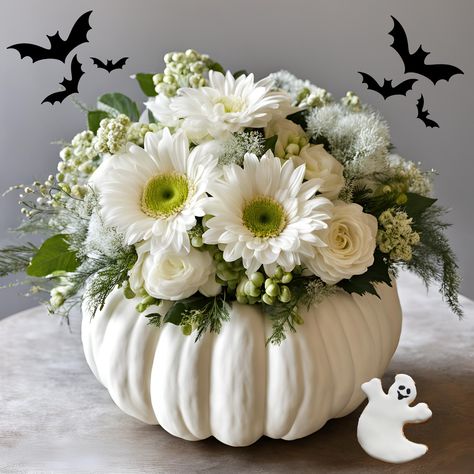 Get into the spooky spirit with our Halloween Ghostly Treat Arrangement! This unique and enchanting floral design features three delightful options: Strawberry Ghost, Vanilla Ghost, or Chocolate Ghosts, with option of fresh flowers or silk flowers (Silk is offered as a nationwide shipping item). Options: Vanilla Ghost: A hauntingly beautiful arrangement with ghostly white flowers, accented with soft greenery and delicate touches of silver for an ethereal feel. Chocolate Ghost: A orange, white cr Gender Neutral Flower Arrangements, Halloween Arrangements, Halloween Themed Flower Arrangements, Pumpkin Flower Arrangements, Ghost Floral Arrangement, White Pumpkin Floral Arrangements, Floral Table Arrangements, Clay Floral Ghosts, White Pumpkin Floral Centerpieces