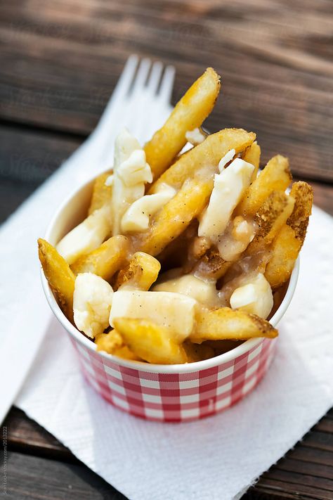 Overhead View Of Poutine In Cup On Table | Stocksy United Wedding Poutine Bar, Fries In A Cup, Poutine Bar, Fries And Drinks In One Cup, Poutine Photography, Cup On Table, Different Poutine Recipes, Hamburger Poutine French Fries, Poutine Fries