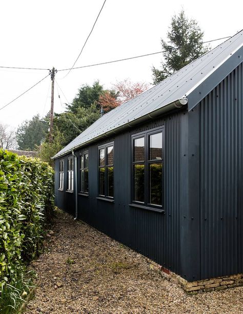 Black Shed, 17th Century House, Shed Makeover, Tin Shed, Black Houses, Tin House, Bedside Wall Lights, Metal Siding, Timber Cladding