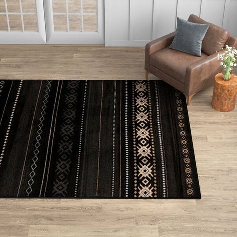 Black Area Rug In Living Room, Tan Sectional, Black Couches, Rustic Area Rugs, Brown Floors, Southwestern Area Rugs, Southwestern Rug, Brown Living Room, Beige Area Rug