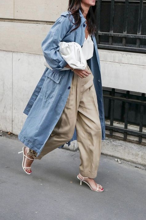 Spring Look  — Denim Trench Coat, White Cami Top, Khaki Panta, Bottega Veneta Pouch, and White The Row Sandals Stylish Spring Outfit, Denim Trench Coat, Denim On Denim, Beige Pants, Bohol, Looks Street Style, Street Style Inspiration, Mode Inspo, Looks Chic