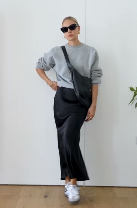 City Shopping Outfit, Slip Skirt And Sneakers, Black Satin Slip Skirt Outfit, Black Straight Skirt Outfit, Silk Skirt With Sneakers, Black Silk Skirt Outfit Winter, Long Skirt And Sneakers Outfit, Black Silk Midi Skirt Outfit, Long Black Satin Skirt Outfit