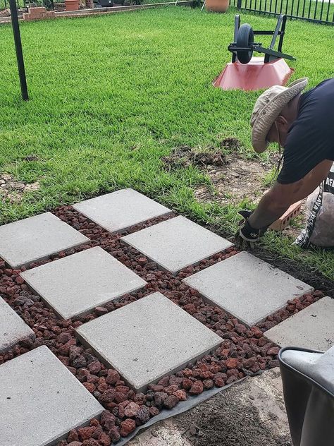 After we extended our patio in 2017 we realized that we had everything EXCEPT a {semi-}permanent home for the grill.We didn't want a patio that spanned the length of our home or anything that couldn't be changed later if we wanted to.In our previous home we extended our patio with pavers & let the grass grow in between for an English garden look & feel. We decided to use a similar technique to create this grill landing pad. Start with a plan.    First I mapped out the space. Using the… Grill Pad Off Deck, Stone Grill Pad, Grill Pad Off Patio, Grill Landing Pad, Extending Patio, Patio With Pavers, Grilling Patio, Grill Pad, Backyard Grilling Area