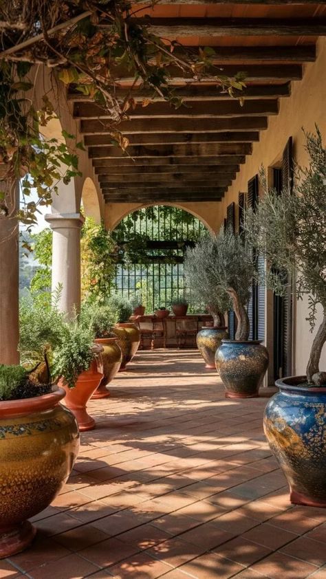 Transform Your Backyard: Creating a Stunning Tuscan Style Patio - The Garden Style Italian Style Backyard, Italian Outdoor Patio, Tuscan Style Patio, Tuscan Terrace, Grass Courtyard, Spanish Style Backyard, Tuscan Backyard, Spanish Backyard, Mediterranean Exterior Design