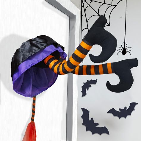 PRICES MAY VARY. Halloween Decorations Outdoor Crashing Witch: 24Inch halloween witch leg wreaths for front door window and tree is perfect for adding a spooky touch to your front door or outdoor décor. Adorned with a striped boots legs and broom, it creates a spine-chilling ambiance that fully immerses your home in the nightmare halloween. Pose-able Witch: There are three suction cups and a straps on the top of the leg that help hold the witch leg stay on the door and tree,post or wherever you Witch Door Decoration, Crashing Witch, Halloween Door Decorations Classroom, Halloween Witch Legs, Tree Hanging Decor, Halloween Outdoor Decoration, Outdoor Halloween Decorations, Halloween Decorations Outdoor, Halloween Witch Decorations