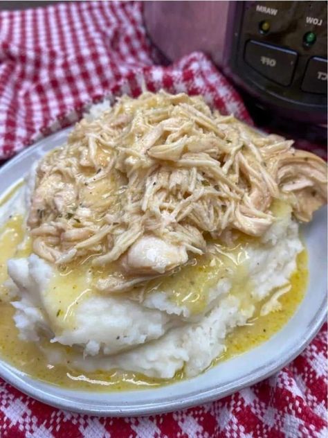 Crockpot Chicken and Gravy Recipe - Tender and juicy chicken with rich and flavorful gravy, perfect for a comforting meal. Chicken Gravy Mashed Potatoes, Crockpot Chicken Gravy, Crock Pot Chicken And Gravy, Gravy Mashed Potatoes, Crockpot Chicken And Gravy, Chicken Gravy Recipe, Chicken And Gravy, Chicken Mashed Potatoes, Potato Gravy