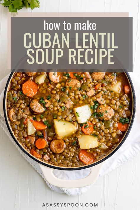 An overhead shot of potaje de lentejas in a dutch oven with the words "how to make cuban lentil soup recipe" in the foreground Dominican Lentil Recipes, Cuban Lentils Recipe, Peruvian Lentils Recipes, Cuban Lentil Soup, Spanish Lentils, Spanish Lentil Soup Recipe, Soaking Lentils, Spanish Lentil Soup, Lentil Soup Crockpot