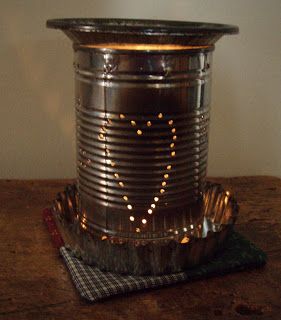 Tin can tart warmer. This morning I pulled it out, taped a simple design ( hearts and stars) to it and got busy punching holes using a nail and hammer. Diy Wax Warmer Mason Jars, Diy Wax Warmer, Diy Candle Warmer, Wax Warmer Diy, Diffuser Diy, Tart Burner, Diy Wax Melts, Tart Warmer, Diy Wax