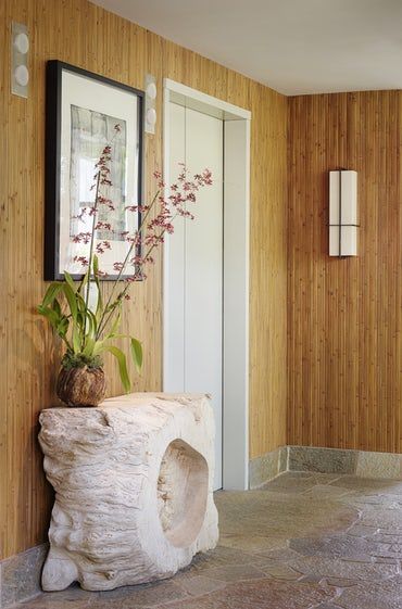 Penthouse Apartment Entry with bamboo wall covering and stone floor Foyer Design Detail Modern Asian by Alan Design Studio Bamboo Wall Covering, Hotel Interior Bedroom, Bamboo Wall Decor, Apartment Entry, Indoor Bamboo, Interior Design Portfolios, Stone Floor, Bamboo Wall, Modern Hallway