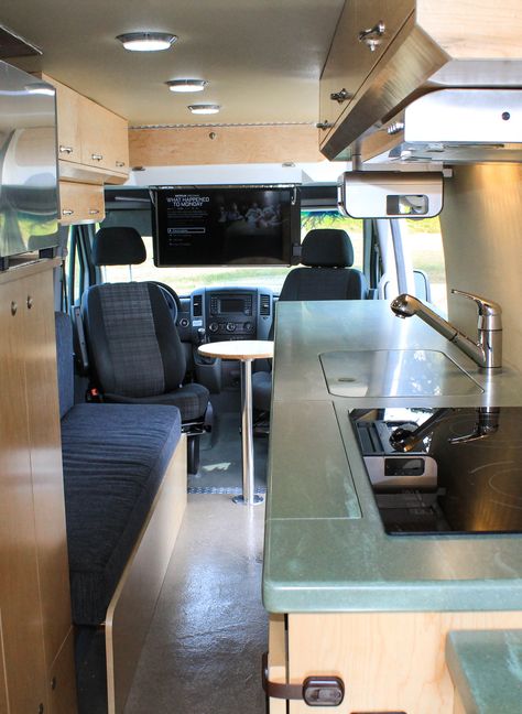 "Silver Bullet", a 2015 Mercedes Sprinter 170 Extended High Roof Cargo Van Converted to a Home on Wheels! #van #vanlife #tv #netflix #mercedesbenz #sprintervan #convertedsprinter #sprinterconversion #kitchen #kitchenette #homeonwheels #tinyhome #tinyliving #tinyhouse #freedomvans Viscount Caravan, Ford Transit Conversion, Mercedes Benz Vans, Sprinter Conversion, Van Dwelling, Rv Van, Adventure Van, Camper Storage, Van Build