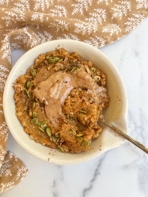 Simple and high-protein warm pumpkin protein bowl recipe Pumpkin Breakfast Bowl, The Peachy Spoon, Pumpkin Protein Breakfast, The Peachie Spoon Recipes, Peachie Spoon Recipes, The Peachie Spoon, Pumpkin Protein Oatmeal, Peachie Spoon, Protein Bowl