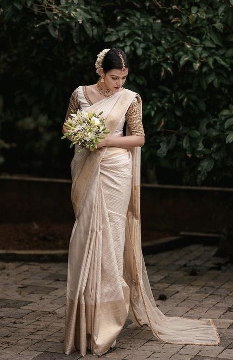 Beige Wedding Saree, Malayalee Wedding Saree, Indian Christian Wedding Saree, Christian Saree Wedding, Madhuramveppu Ideas, Off White Saree Look, Buddhist Bride In White Saree, Christian Bride Saree, Kerala Christian Wedding Saree