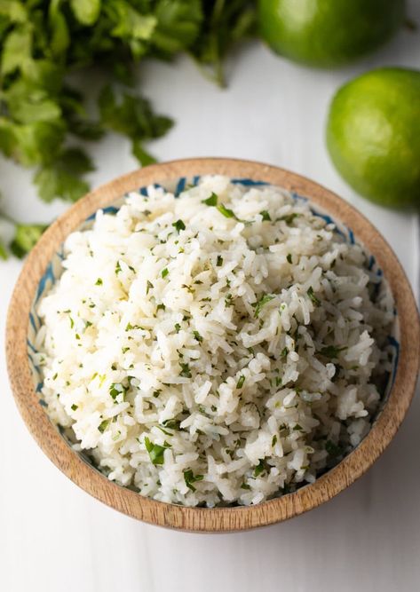 Bowl of copycat chipotle rice. Chipotle Bowl Copycat, Chipotle Copycat Recipes Bowls, At Home Chipotle Bowl, Chipotle Bowl At Home, Chipotle Bowls At Home, Copycat Chipotle Rice, Chipotle Rice Recipe, Homemade Chipotle Bowl, Chipotle Lime Rice