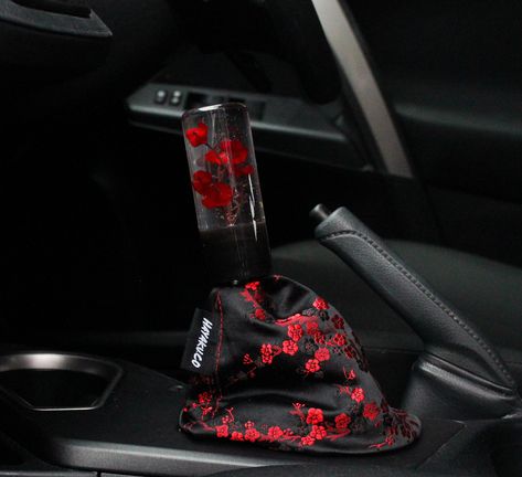 Add a gorgeous new piece to your interior with the Red Sakura shiftboot! This shiftboot features a silky sheen material featuring a beautiful array of sakura flowers all around, a perfect addition to any interior and a serious match with our Sakura Shiftknob. Flower Shift Knob, Mk1 Miata, Shift Knobs, Cool Car Accessories, Car Interior Design, Cute Car Accessories, Car Mods, Pink Car, Red Boots