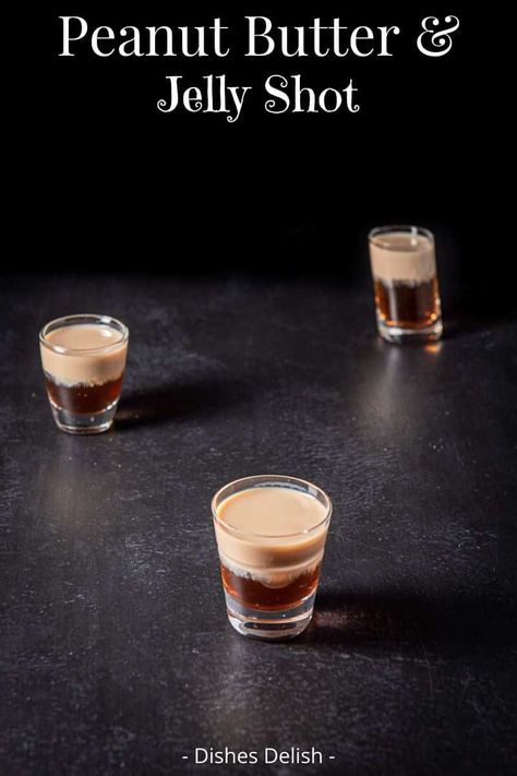 The peanut butter and jelly shot is a combination of Chambord, Frangelico and Baileys and makes for a delicious and fun layered shot. You can make it like this or shaken in a cocktail shaker and poured into the glass. Try it this way first! #pbj #peanutbutterandjellyshot #layeredshot #dishesdelish After Eight Chocolate, Cocktail Shots, Shots Alcohol, Liquor Drinks, After Eight, Boozy Drinks, Shot Recipes, Peanut Butter And Jelly, Milk Shakes