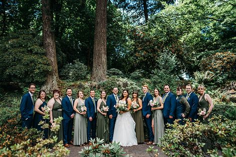 Blue groomsman suits.  I like paired with the olive green bridesmaids dresses #crystalspringsrhododendrongarden #portlandparkwedding #portlandweddingvenue #oregonbride #portlandweddingphotographer #portlandweddingvenues #portlandoregon #gardenwedding #outdoorwedding #parkwedding #urbanwedding #olivegreendresses #navysuits Navy Blue Suit And Sage Green Dress, Navy Blue And Moss Green Wedding, Olive Green Bridesmaid Dress Navy Suit, Green Dresses Blue Suits, Navy Groomsmen Suits And Green Bridesmaids, Blue Groomsmen Suits And Green Bridesmaids, Green Groom Suit Blue Groomsmen, Olive Green Bridesmaid Dress With Navy Suits, Olive And Navy Blue Wedding