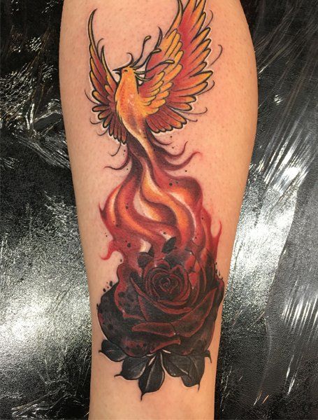 20 Striking Phoenix Tattoos for Women in 2021 - The Trend Spotter Ashes Tattoo Ideas, Rising From The Ashes Tattoo, From The Ashes Tattoo, Ashes Tattoo, Phoenix Feather Tattoos, Tato Phoenix, Rose On Fire, Phoenix Rising From The Ashes, Fenix Tattoo