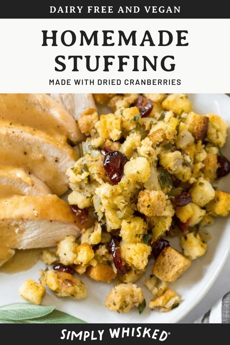 This easy, homemade stuffing recipe is made from scratch with croutons and loaded with flavor thanks to all the savories and cranberries. It’s baked in the oven and can be made in advance, so it’s perfect for Thanksgiving. Plus, this almost traditional stuffing is naturally vegan and dairy free. #stuffing #Thanksgiving Dairy Free Stuffing, Easy Homemade Stuffing, Homemade Stuffing Recipe, Baked Stuffed Pork Chops, Homemade Stuffing Recipes, Dairy Free Thanksgiving, Traditional Stuffing, Stuffing Thanksgiving, Easy Thanksgiving Dinner