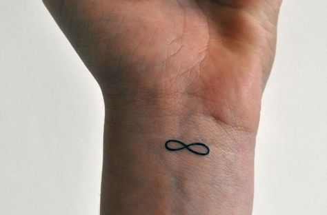 Dainty Infinity Tattoo, Minimalist Tattoo Infinity, Tiny Infinity Tattoos For Women, Infinity Tattoo Wrist, Small Infinity Wrist Tattoos For Women, Infinity Wrist Tattoo, Infinite Symbol Tattoo, Tattoo Ideas Infinity Signs, Small Tattoos Infinity Sign