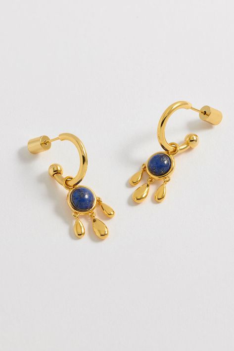 Elevate your look with our gold-plated Gemstone Drop Hoops. Featuring a small hoop earring with a lapis drop charm, a stone of wisdom and strength, these earrings will upgrade any outfit. Pair it with our matching Gemstone Droplet Pendant Necklace for the full look. Please note that due to the natural quality of our gemstones, the colour is unique to each piece and may vary from the image on our site. Read more about our care guidelines here. Details An earring measures 3x0.8cm overall. The hoop Convertible Jewelry, Small Gold Hoop Earrings, Small Gold Hoops, Full Look, Gold Hoop Earrings, Gold Plate, Hoop Earrings, Plating, Pendant Necklace