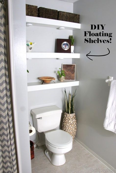 DIY Floating Shelves in Bathroom above toilet {Reality Daydream} Above Toilet, Shelves Above Toilet, Diy Floating Shelves, Shelves Over Toilet, Bathroom Shelves Over Toilet, Floating Shelf Decor, Bathroom Shelf Decor, Toilet Shelves, Floating Shelves Bathroom