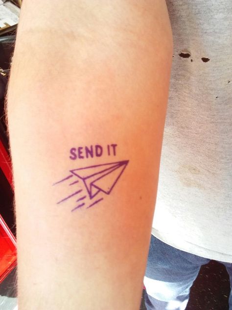 Tattoo airplane with text above It saying send It Send It Tattoo Ideas, Tattoo Paper Airplane, Send It Tattoo, It Tattoo Ideas, Tattoo Airplane, Tattoo Photoshoot, It Tattoo, Airplane Tattoo, Airplane Tattoos