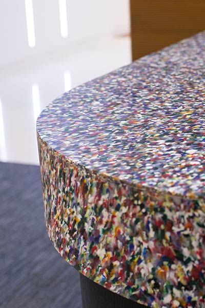 Recycled Plastic Materials Design Smile Plastics modular Coffee Bar . Photo by Smile Plastics. Inspiration Kaleido Recycle Plastic Furniture, Recycled Plastic Tiles, Plastic Product Design, Smile Plastics, Recycled Plastic Products, Recycled Plastic Terrazzo, Plastic Waste Art Installation, Plastic Recycling Process, Recycle Design