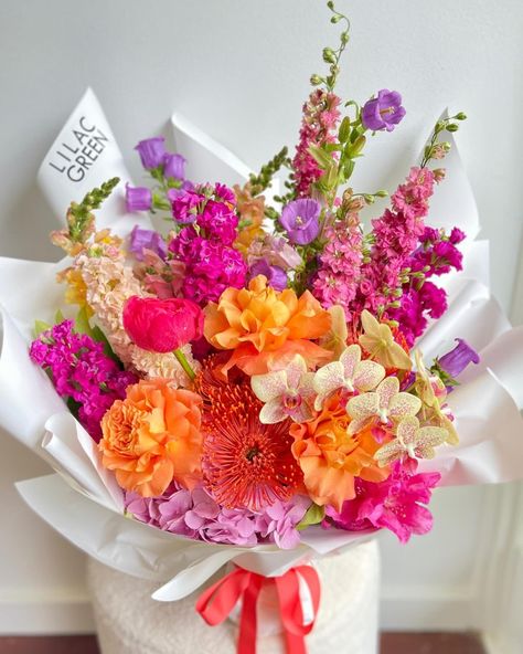 Flower Bouquet Bright Colors, Red Pink Orange Wedding Bouquet, Multicolor Prom Bouquet, Pink Orange Purple Bouquet, Colorful Wedding Centerpieces, Pink Purple Orange Flower Arrangement, Bridal Shop Decor, Sicilian Wedding, Mason Jar Herb Garden