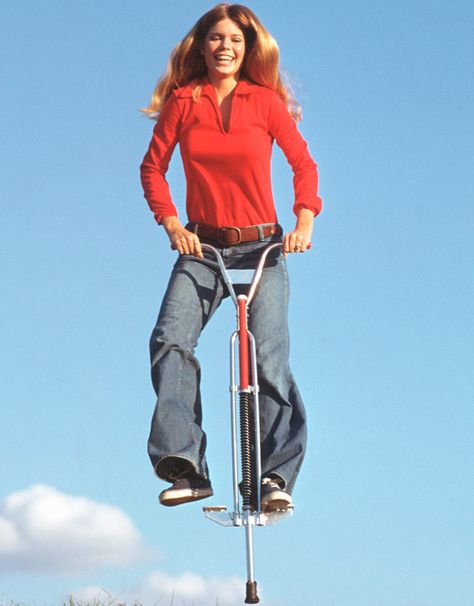 Pogo Sticks Woman Jumping, Pogo Stick, Happy Woman, Getty Images, High Resolution, Resolution