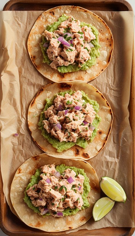 Tuna tostadas are a fantastic option for a quick lunch or a delightful appetizer. They bring a burst of flavor and texture that’s hard to resist. Whether you’re enjoying them at a gathering, or simply indulging on a casual weeknight, the combination of crunchy tostadas and zesty tuna is simply mouthwatering.  Ingredients You’ll Need For Tuna Tostadas  Before you get started, let’s gather all the ingredients for your tuna tostadas. You’ll want to ensure everything is fresh and ready to go. Here’s Tuna Tostadas Recipes, Fish Tostadas, Tuna Tostadas, Kid Approved Dinners, Tostadas Recipe, Tuna Tacos, Tuna Recipes, Coleslaw Recipe, Quick Lunch