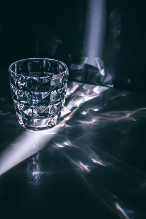 Glass with refraction pattern in darkness · Free Stock Photo Glass Cup Photography, Light Reflection Photography, Drawing Shadows, Light And Shadow Photography, Reflection Photos, Reflection Art, Glass Photography, Empty Cup, Reflection Photography