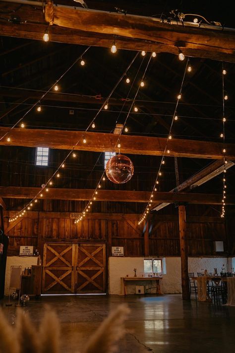 DIY Trendy Barn Disco In Canada - photo by Hailey Joy Photography Country Party Ideas Decoration, Country Wedding Dance Floor, Western Wedding Dance Floor, Barn Party Decor, Western Prom Theme Decorating Ideas, Stage Coach Aesthetic, Diy Barn Wedding Ideas, Sweet 16 Barn Party Ideas, Diy Barn Wedding Decorations