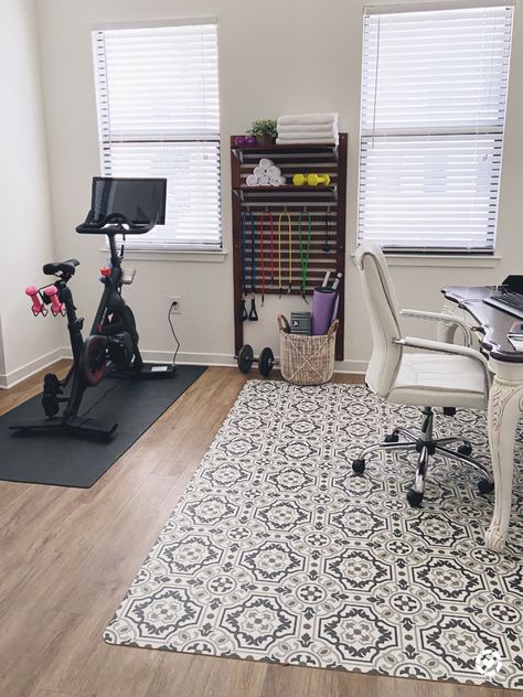 Workout Area In Office, Black Furniture Office Decor, Organize Spare Room, Office And Workout Room Combo Ideas, Small Peloton Space, Small Gym Office Combo Work Spaces, Peloton Home Office, Home Gym Office Combo Small Spaces, Elliptical In Bedroom