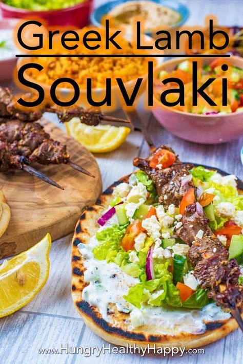 This homemade Greek Lamb Souvlaki tastes just like you would find down a side street in Greece. Tender chunks of lamb cooked on the grill after being marinated in a generous amount of olive oil, garlic, lemon juice and herbs. Serve with flatbreads, tzatziki and all the trimmings for a great recipe to feed a crowd.  #souvlaki #greek #skewer #kebab Souvlaki Greek, Lamb Souvlaki, Souvlaki Recipe, Greek Diet, Greek Lamb, Olive Oil Garlic, Feed A Crowd, Lamb Recipes, Feeding A Crowd