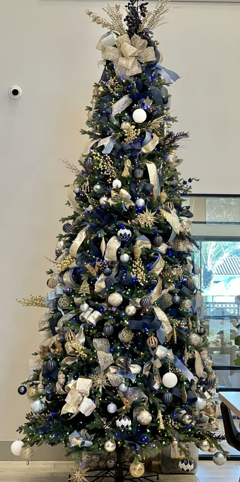 Navy Blue Silver And Gold Christmas Tree, Blue And Gold Tree Decorations, Champagne And Navy Christmas Tree, Christmas Tree Ideas Gold And Blue, White And Navy Christmas Tree, Christmas Tree Navy Blue And Gold, Midnight Blue Christmas Decorations, Blue Gold White Christmas Tree, Blue White And Gold Christmas Decor