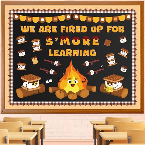 PRICES MAY VARY. PACKAGE INCLUDES - This camping campfire themed bulletin board decorations set includes a 'WE ARE FIRED UP FOR S'MORE LEARNING' letter cutout set, 32 little marshmallow and cookie cutouts, 2 big marshmallow cutouts, 2 banner cutouts, 1 campfire cutout, 16 brown plaid bulletin board borders, and comes with 60 glue points. The ample quantities enable you to exercise your creativity, freely mixing and matching elements to transform your space into a vibrant, colorful world. MARSHMA Bonfire Bulletin Board, Ready For S'more Learning Bulletin Board, Smore Learning Bulletin Board, Smore Bulletin Board, Camping Theme For Classroom, Smores Bulletin Board, 4h Bulletin Board Ideas, S’more Classroom Theme, S’mores Bulletin Board