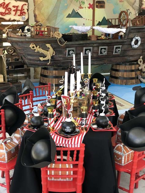 Jacobs Pirate party  | CatchMyParty.com Jack Sparrow Birthday Party, Pirate Themed 1st Birthday Party, A Pirates Life Four Me Party, Kids Pirate Birthday Party, Pirate Balloon Garland, Pirate First Birthday Party, Pirate Centerpiece Ideas, One Piece Decoration Party, Pirates Of The Caribbean Birthday Party