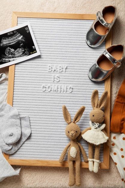 Free photo flat lay pregnancy announceme... | Free Photo #Freepik #freephoto #pregnancy-announcement #still-life #announcement-board #flat-lay Flat Lay Pregnancy Announcement, Safe Nursery, Announcement Board, Practical Baby Shower Gifts, Calm Color Palette, Baby Gift Guide, Adorable Nursery, Stylish Nursery, Adorable Newborn