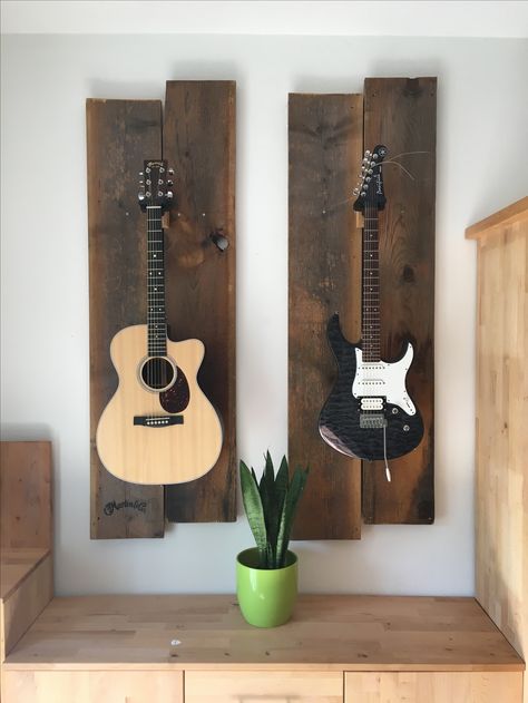 Home Decor With Guitar, 2 Guitars On Wall, Hanging Musical Instruments On Wall, Framed Guitars On Wall, Guitar Rack Wall, Displaying Guitars On Wall, Guitar Wall Bedroom, Guitar Wall Mount Ideas, Guitars On Wall Living Room