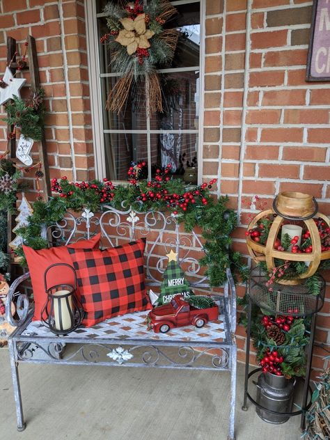 Outdoor Bench Decorating Ideas Christmas, Front Porch Bench Christmas Decor, Christmas Bench Ideas Front Porches, Porch Bench Christmas Decor, Decorate Porch Bench For Christmas, Log Cabin Front Porch Christmas Decor, Bench Front Porch, Wooden Christmas Presents Front Porches, Joy Decor