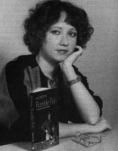 Susan Eloise Hinton (born July 22, 1948) is an American writer best known for her young-adult novels set in Oklahoma, especially The Outsiders, which she wrote during high school. For her cumulative contribution to young-adult literature she received the inaugural Margaret A. Edwards Award in 1988. That Was Then This Is Now Se Hinton, That Was Then This Is Now, Greasers The Outsiders, Rusty James, Se Hinton, Rumble Fish, Book Man, Sodapop Curtis, Ponyboy Curtis