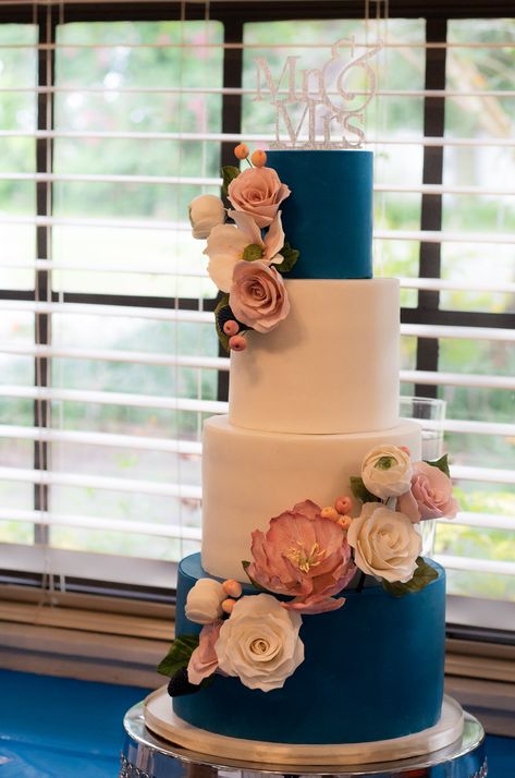 4 tier wedding cake with blush, pink,and white sugar flowers Tampa Bay Navy Blue And Blush Pink Wedding Cake, Navy Blue And Blush Wedding Cake, Navy Blue And Pink Wedding Cake, Navy Blue And Pink Cake, Navy And Pink Wedding Cake, Navy And Blush Wedding Cake, Blue And Pink Wedding Cake, Pink And Blue Wedding Cake, 4 Tier Wedding Cakes