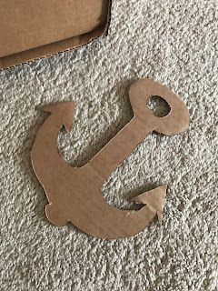 Pirates Decorations Diy, Pirate Ship Wheel Diy, Pirate Ship Decorations Diy, Diy Pirate Ship Cardboard, Pirate Ship Decor, Pirate Diy Decorations, Diy Pirate Flag, Cardboard Pirate Ship Diy, Titanic Decor